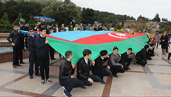 A drawing action on the asphalt named "Our flag is our pride!" was held